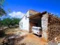 Two houses in a rustic building with its own well