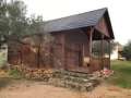 Two houses in a rustic building with its own well