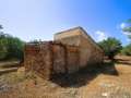 Two houses in a rustic building with its own well